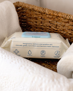 mom&moi Premium Bamboo Baby Wipes in a wicker basket with 99% Purified Water and 100% Bamboo Fabric for newborn and sensitive skin
